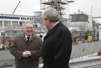 Premier Darrell Dexter talks with Jim Irving, CEO of Irving Shipbuilding, following the announcement.