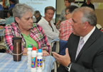 Sherry Fitzgibbon talks with Health and Wellness Minister David Wilson before the seniors afternoon bingo game.