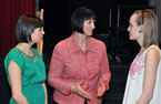 Education Minister Ramona Jennex chats with Dartmouth High School Grade 12 students Laura Rigg and Rosa Poirier-McKiggan.