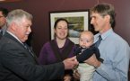 Natural Resources Minister Charlie Parker chats with young Silas Maass, his dad Oliver Maass, with the protected areas and wetlands branch of the Environment Department and Karen McKendry.