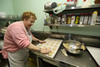 Minister of Seniors Denise Peterson-Rafuse makes some cookies.