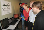 Students look over a Colibri Software display at the event yesterday.
