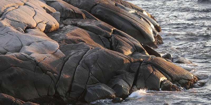 Exposed shoreline with slippery wet rocks