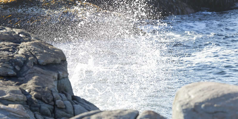 Wave hitting the rocks at Peggys Cove