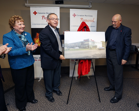 A picture of the new Red Cross Facility is presented by Premier Daryl Dexter