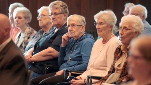 Sisters of Saint Martha listen to the announcement about a new long term care facility.