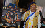 Grand Chief Ben Sylliboy unveils the Mi'kmaq History Month poster.