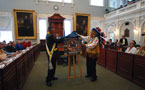 Grand Chief Ben Sylliboy and Grand Keptin Andrew Denny unveil the Mi'kmaq History Month poster.