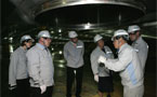 Premier, NS delegation, being given tour of LNG tanker by Mr. Du-Seon Park.