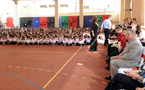 Premier Darrell Dexter sits in the foreground during a student assembly at Abu Dhabi Grammar School.