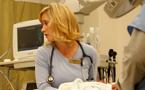 Emergency room nurse Krista Lloy, monitors the status of a patient in the emergency department at the QEII Health Sciences Centre.