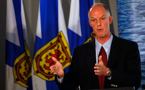 Dr. John Ross talks with media after the release of his report to improve emergency health care in Nova Scotia.