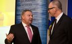 Premier Darrell Dexter talks with Michael Donovan, executive producer and CEO of DHX Media Ltd., following the news conference