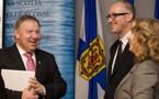 Premier Darell Dexter talks with Michael Donovan, executive producer and CEO of DHX Media Ltd., and Ann MacKenzie, president and CEO of Film Nova Scotia.