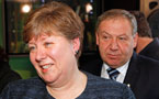 Health Minister Maureen MacDonald listens to a question as Premier Darrell Dexter stands behind her.