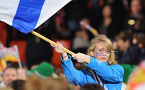The flagbearer for Nova Scotia, Whitney Lohnes, shows her Nova Scotia pride
