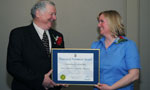 Jim Taylor and Mona Henniger accept the Model Volunteer Community of the Year Award on behalf of Sheffield Mills.