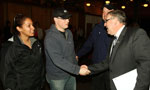 Premier Darrell Dexter shakes hands with Irving Shipyard workers (from left) Natalie Morris, Ryan Prendergast, Carl Risser. The $30-billion National Shipbuilding Procurement Strategy could mean 11,500 additional jobs for Nova Scotia during peak production years.