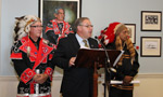 Premier Darrell Dexter, Minister of Aboriginal Affairs, speaks during Treaty Day ceremonies in Province House as co-chairs, Assembly of Mi’kmaq Chiefs, Chief Terrance Paul and Chief Gerard Julian, stand at the podium.