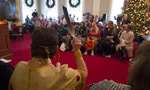 Eskasoni Elder Wilma Simon holds a feather during her opening blessing.