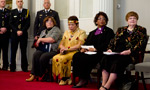 Patricia Gorham from the Department of Justice,  Eskasoni Elder Wilma Simon,  Reverend Rhonda Britton and Minister responsible for the Advisory Council for the Status of Women Marilyn More listen to Stephanie MacInnis-Langley, executive director of the Status of Women.