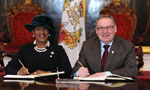 Lt.-Gov. Mayann Francis and Premier Darrell Dexter prepare to sign the Commemorative Message Books  for Her Majesty Queen Elizabeth II's Diamond Jubilee at Province House.