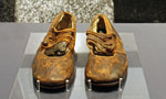 Shoes from a victim of the Titanic disaster or The Northover Titanic Shoes. This pair of leather children’s shoes is believed to be from Body No. 4, the “Unknown Child”. This very young boy, recovered by the crew of Mackay-Bennett, was buried at Fairview Lawn Cemetery in Halifax. Credit: Gerry Lunn, Maritime Museum of the Atlantic