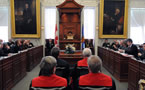 Members of the House of Assembly prepare to listen to Lt.-Gov. Mayann Francis read the Speech from the Throne.