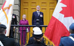 Lt.-Gov. John James Grant and Ms. Joan Grant are presented on the steps of Province House.