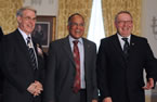 Leonard Preyra, the new the Minister of Communities, Culture and Heritage, smiles as he stands between Premier Darrell Dexter and Lt.-Gov. John James Grant during the swearing-in ceremony.