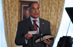 Leonard Preyra, the new the Minister of Communities, Culture and Heritage, takes his oath of office.