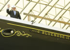 Premier Darrell Dexter waves from the deck Bluenose II, which is getting an extensive refit.