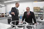 Paul Yeatman, GeoSpectrum Technologies Inc., talks to Premier Darrell Dexter about some of the work being at the company.