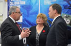 Premier Darrell Dexter, Karen Isenor, GeoSpectrum Technologies Inc., and  Colin Stephenson, DEFSEC Atlantic, have a discussion.