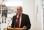 Communities, Cultures and Heritage Minister Leonard Preyra addresses the crowd at the announcement