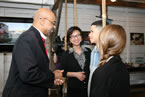 Economic and Rural Development and Tourism Minister Percy Paris chats with three of the Nova Scotians who appear in the new tourism campaign.