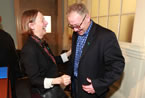 Lucille Harper, from the Antigonish Women's Resource Centre, laughs after pinning the symbol for Sexual Assault Awareness Month on Premier Darrell Dexter's lapel.