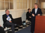 Premier Darrell Dexter listens as Stephanie MacInnis-Langley, executive director, Status of Women speaks at the event.