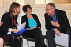 Lucille Harper, Antigonish Women's Resource Centre, Irene Smith, Avalon Sexual Assault Centre and Premier Darrell Dexter chat during a break in speeches.