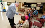 Premier Darrell Dexter greets members of the Boys and Girls Club.