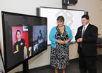 MLA Becky Kent, on behalf of Labour and Advanced Education Minister Frank Corbett, and Construction Association of Nova Scotia president Duncan Williams, check out the new high-definition video system that will be used for training.