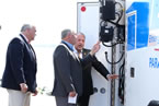 Premier Darrell Dexter and Health and Wellness Minister David Wilson look at details on the new ambulance with Keith Condon, president of Tri-Star Industries.