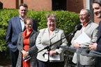 Premier Darrell Dexter and Finance Minister Maureen MacDonald react during the event.