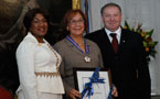 Viola Marie Robinson stands between Lt.-Gov. Mayann Francis and Premier Darrell Dexter after the Order of Nova Scotia ceremony.