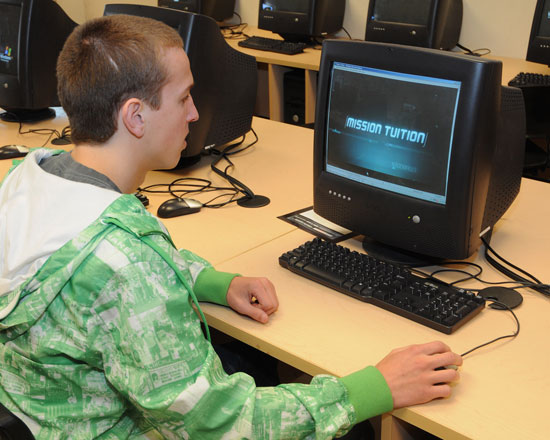 Student playing Mission Tuition at Halifax West High School