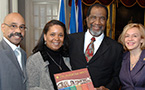African Nova Scotian Affairs Minister Percy Paris stands, with family members of Wilena Jones, one of the women featured on the official poster. Pictured are, from left: Percy Paris, Tracey Jones, Burnley (Rocky) Jones and Tourism, Culture and Heritage ministerial assistant Lenore Zann.