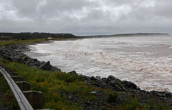 Waves crash ashore at Lawrenceton beach as Hurricane Bill brushes by Nova Scotia