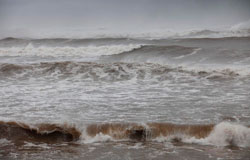 Waves crash ashore at Lawrenceton beach as Hurricane Bill brushes by Nova Scotia