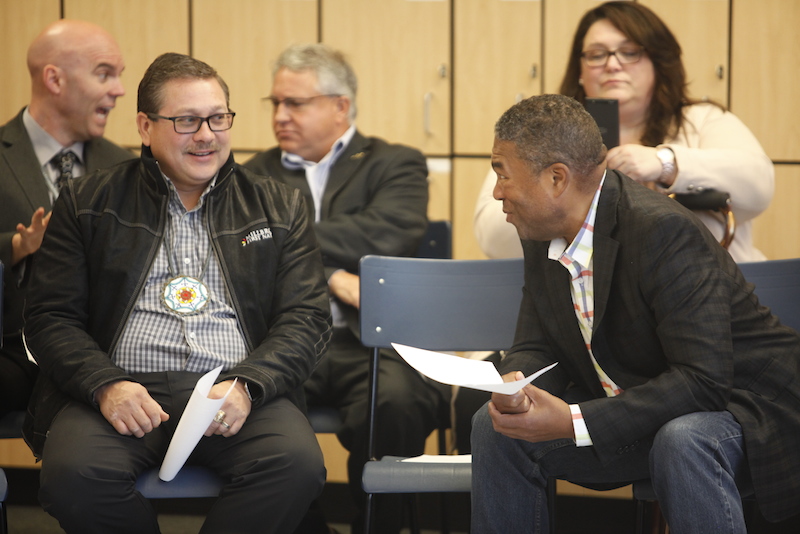 Millbrook Chief Robert Gloade talks to Communities, Culture and Heritage Minister Tony Ince.