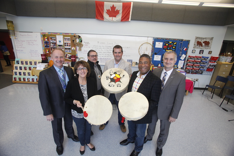Jeff Lynds, principal, Truro Elementary School; Education and Early Childhood Development Minister Karen Casey; Millbrook Chief Robert Gloade Jude Gerrard, Treaty Education consultant, Education and Early Childhood Development; Communities, Culture and Heritage Minister Tony Ince, and Gary Adams, superintendent, Chignecto - Central Regional School Board, participate in Drum Day at Truro Elementary School.